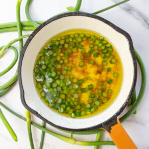 Browned Butter with Garlic Scapes (Over Local Mixed Veggies)