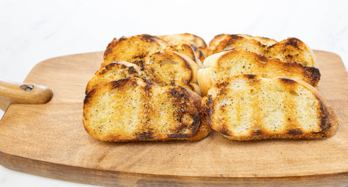 Toasted 1/2 inch slices of Sourdough Baguette
