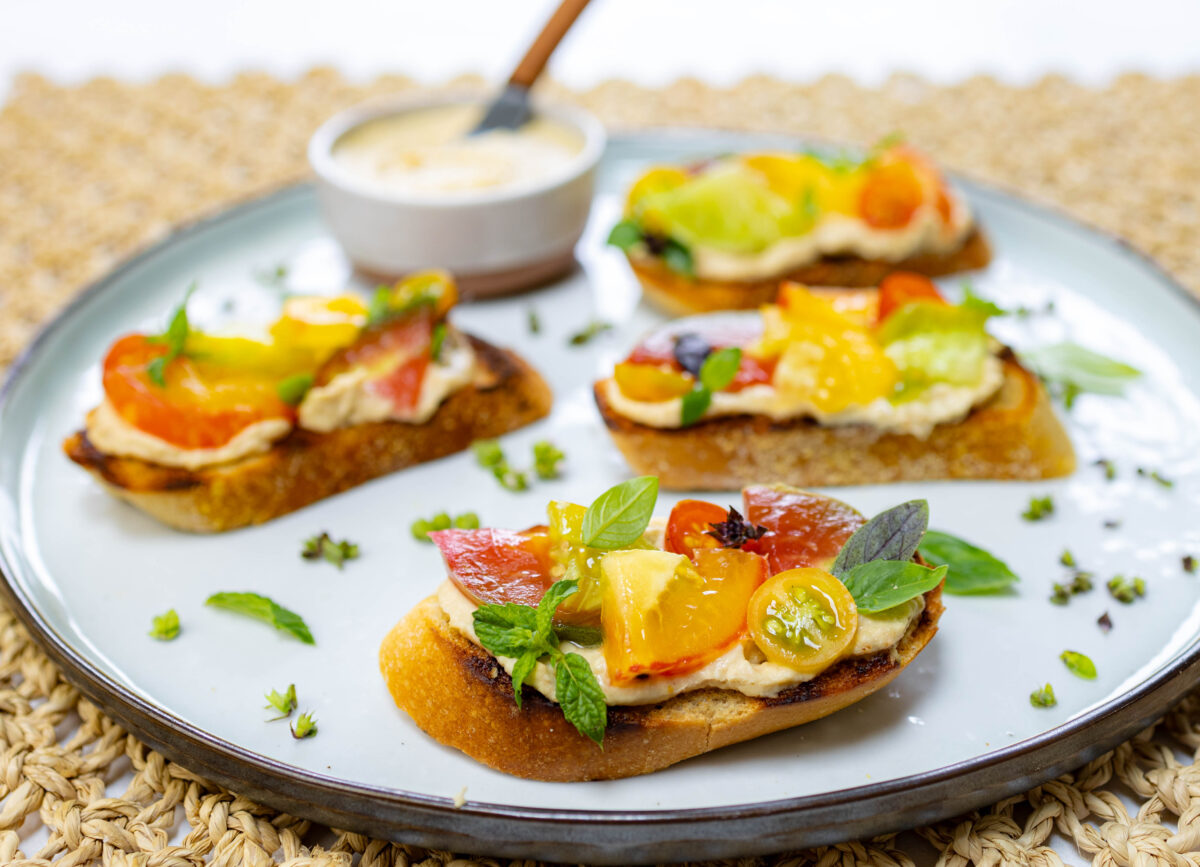 Heirloom Tomato Bruschetta with Hummus, Mint & Basil