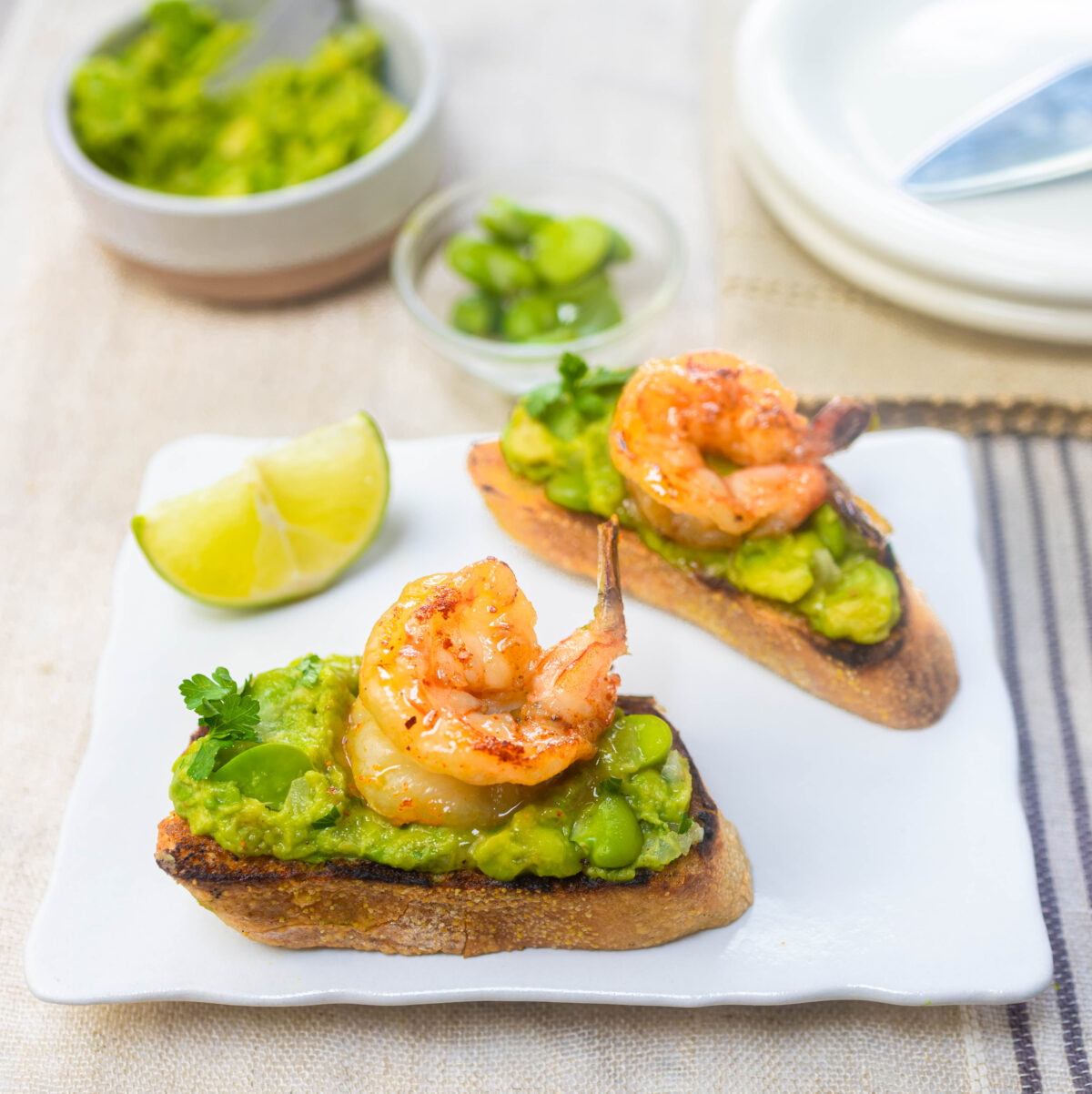 Smashed Avocado with Fava Bean Bruschetta and Honey Spiced Shrimp